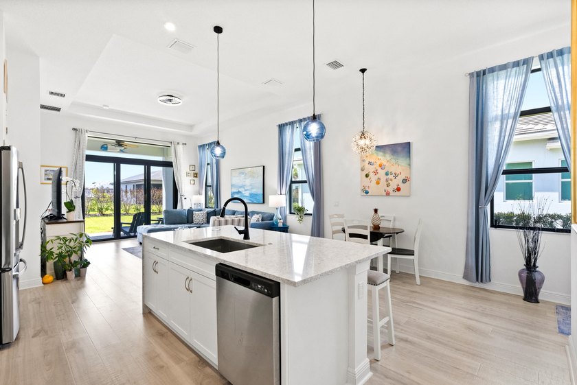 Welcome to luxury living in PGA Verano! This 2024 Alison model - photo 13