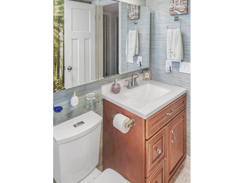 UPDATED! UPDATED! UPDATED! NEWLY RENOVATED CORNER UNIT ON THE - photo 14