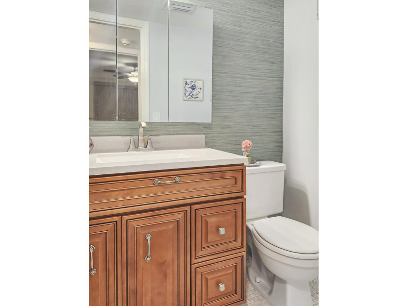 UPDATED! UPDATED! UPDATED! NEWLY RENOVATED CORNER UNIT ON THE - photo 17