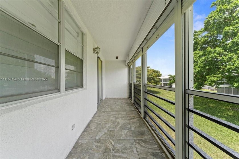 UPDATED! UPDATED! UPDATED! NEWLY RENOVATED CORNER UNIT ON THE - photo 23