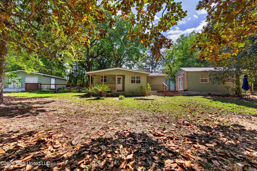 This home is tucked away on a 3 acre parcel. This charming 2 - photo 2