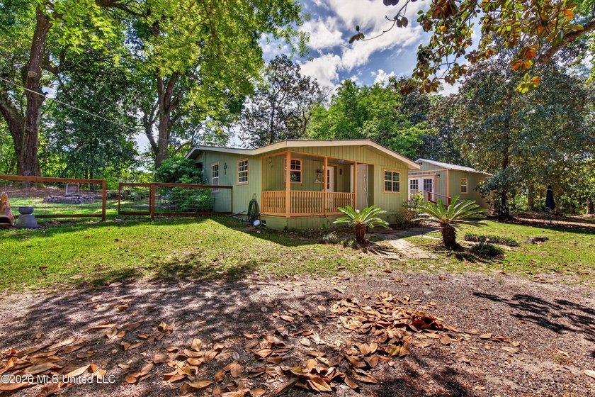 This home is tucked away on a 3 acre parcel. This charming 2 - photo 4