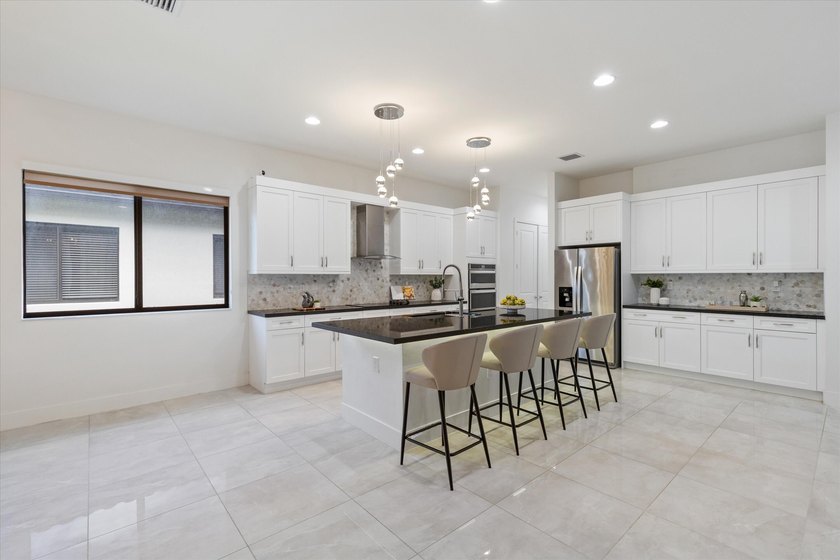 WELCOME TO ONE OF THE MOST PRESTIGIOUS AND RARELY AVAILABLE - photo 5