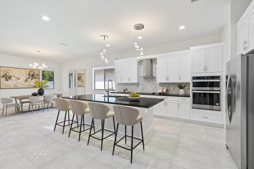 WELCOME TO ONE OF THE MOST PRESTIGIOUS AND RARELY AVAILABLE - photo 6