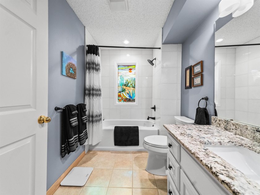 Updated and filled with light! One-level home on a private - photo 35