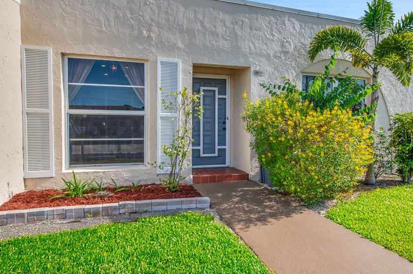 Welcome to this bright 2-bedroom, 2-bathroom condominium located - photo 7