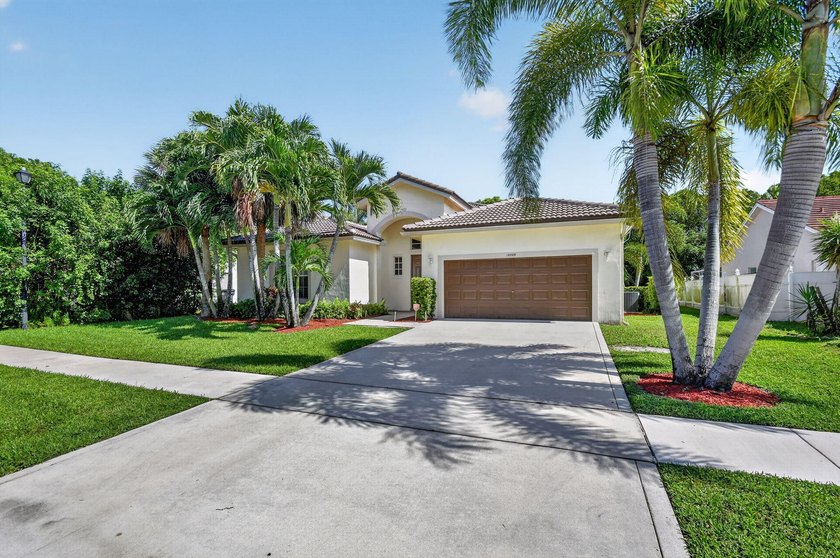 Welcome to this pristine, single-story pool home zoned for - photo 4