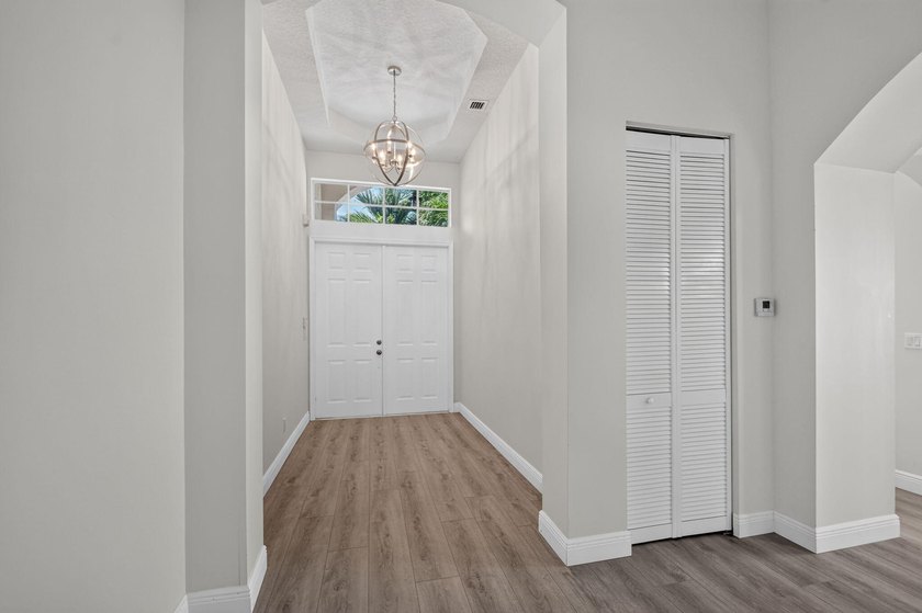 Welcome to this pristine, single-story pool home zoned for - photo 8