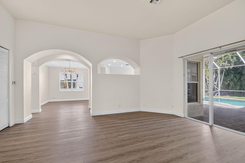 Welcome to this pristine, single-story pool home zoned for - photo 10