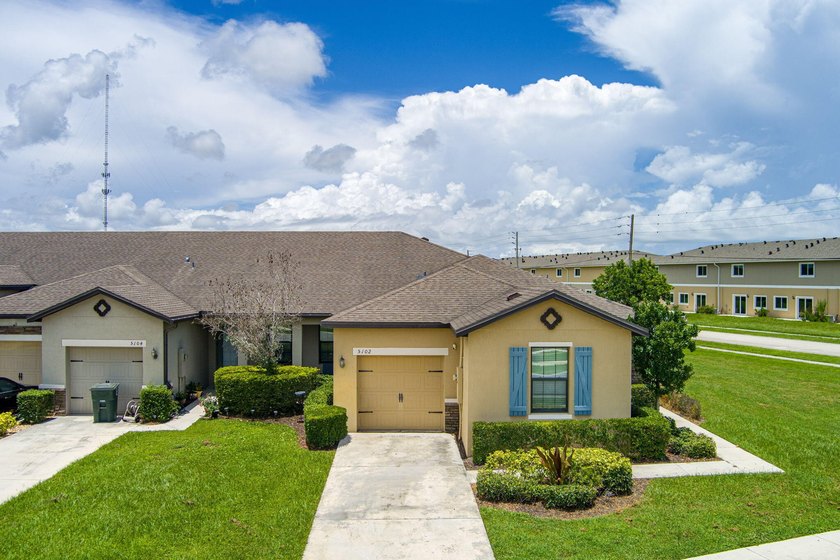 Welcome to this spacious 4-bedroom, 2-bathroom townhome built in - photo 2