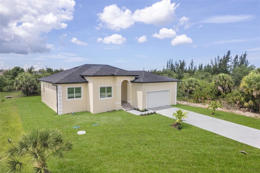 Virtually Staged. Discover luxury coastal living in this - photo 3