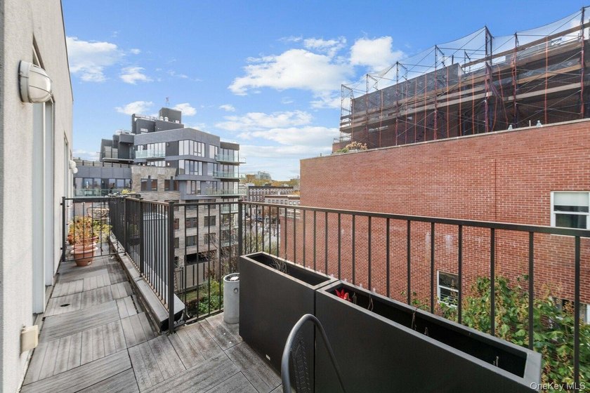 Sun-Drenched Duplex Living with Three Private Outdoor Spaces - photo 11
