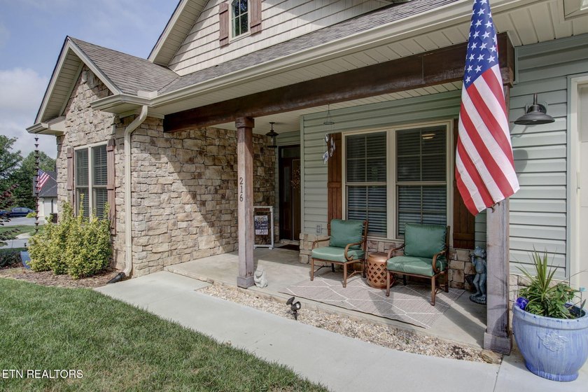 Welcome to this beautifully crafted one-level home in the highly - photo 2