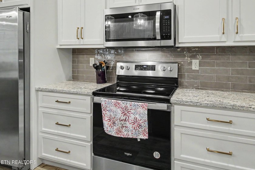 Welcome to this beautifully crafted one-level home in the highly - photo 9