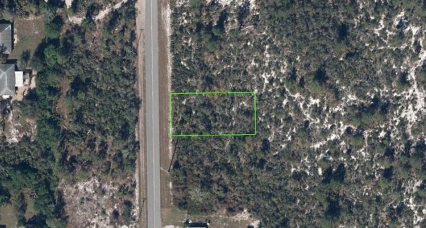 Discover the potential of this spacious lot located in the - photo 2