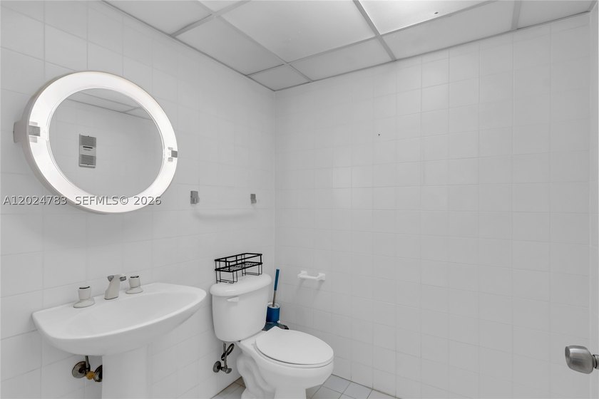 Live in the largest corner unit in a prestigious community of - photo 11