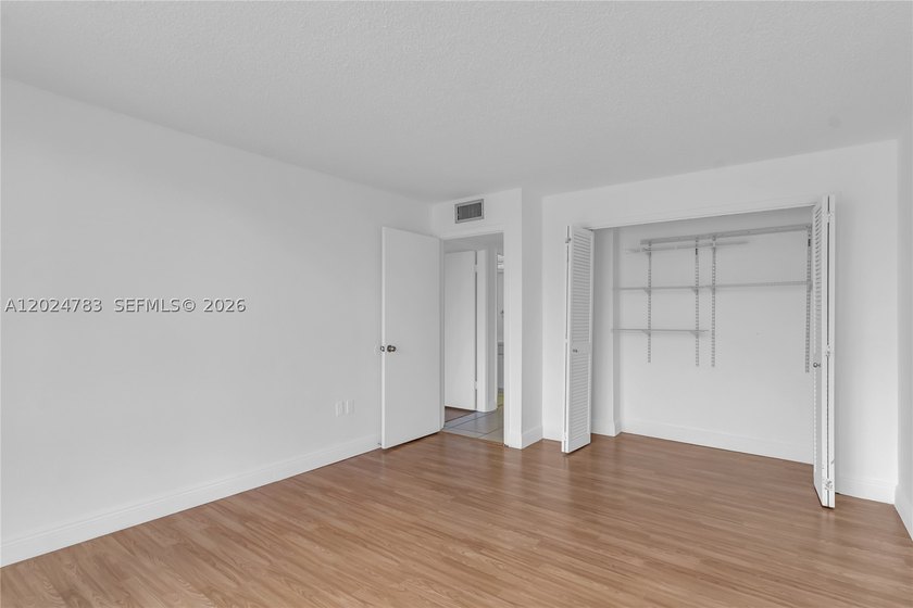 Live in the largest corner unit in a prestigious community of - photo 17