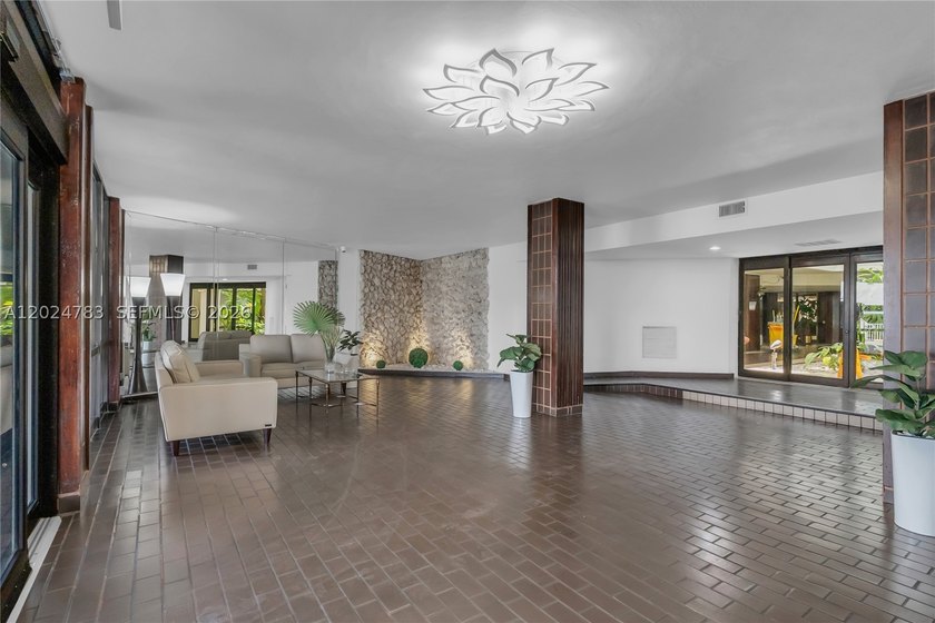 Live in the largest corner unit in a prestigious community of - photo 25
