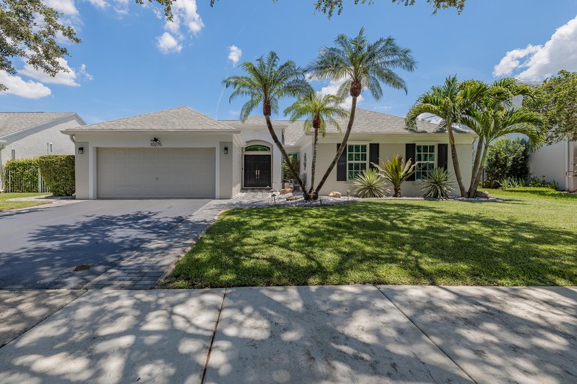 Step into this immaculate, model-like 3BR/2BA home with a den in - photo 3