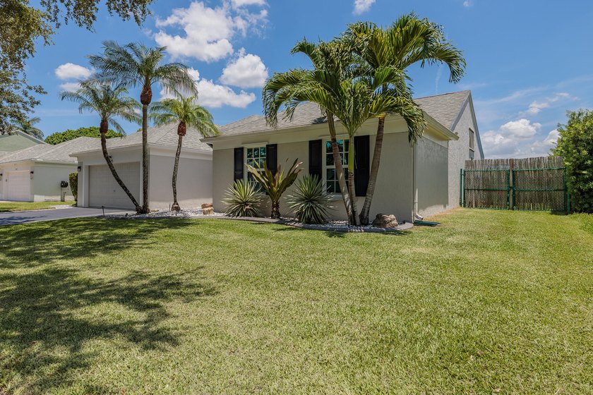 Step into this immaculate, model-like 3BR/2BA home with a den in - photo 4