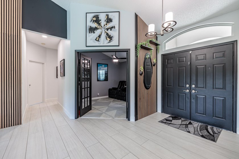 Step into this immaculate, model-like 3BR/2BA home with a den in - photo 7