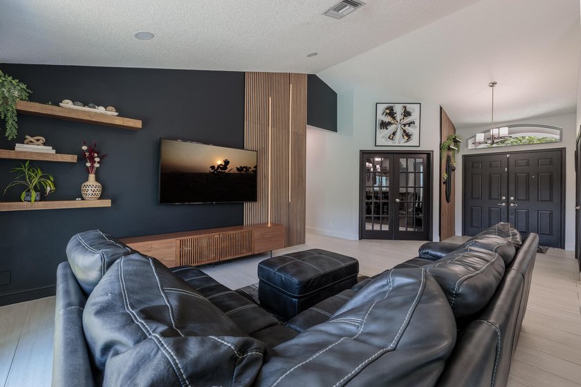 Step into this immaculate, model-like 3BR/2BA home with a den in - photo 9