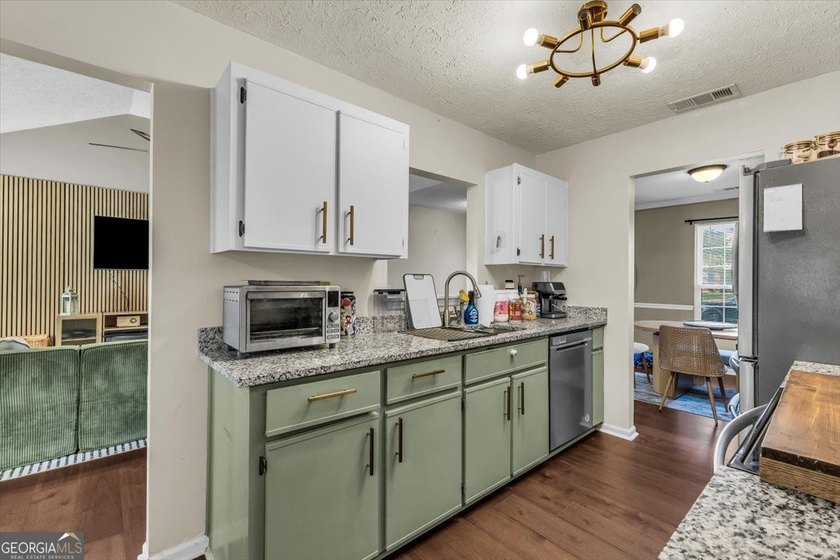 Welcome home to this charming 3-bedroom, 2-bath home in the - photo 12