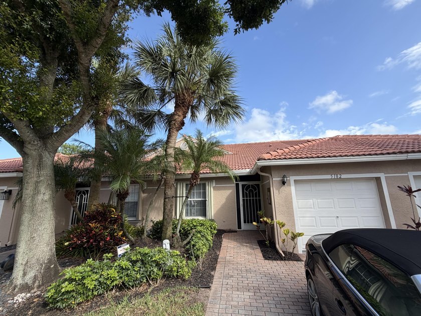 Located in the desirable Tuscany Bay community, this charming - photo 5