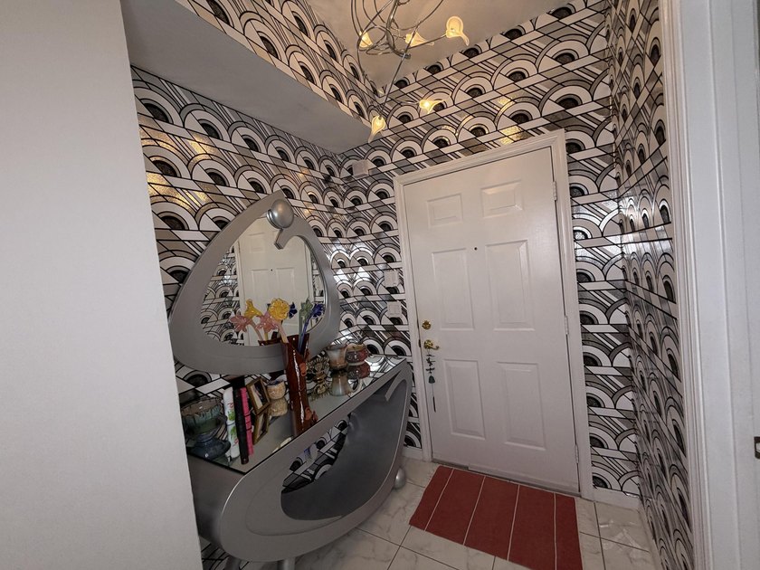 Located in the desirable Tuscany Bay community, this charming - photo 7