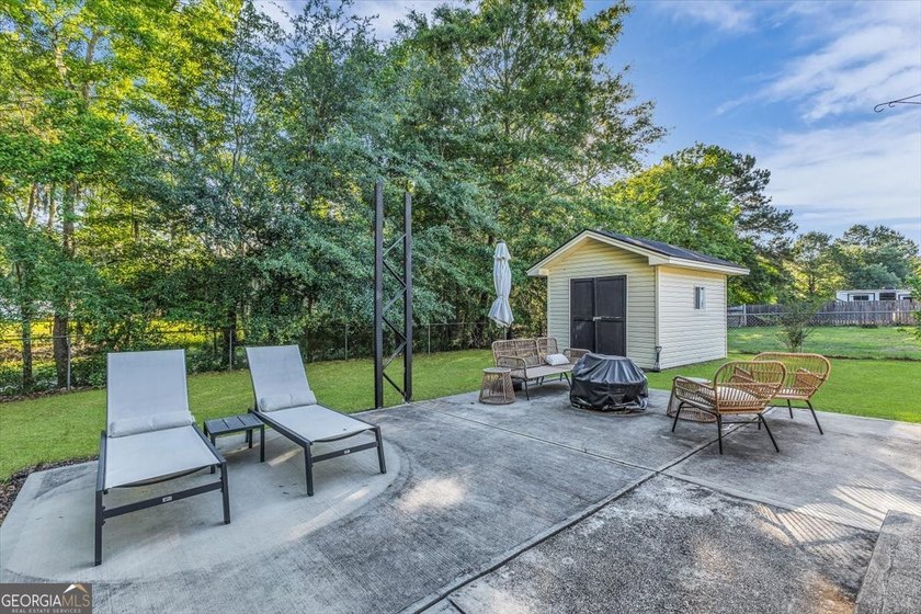 Welcome home to this charming 3-bedroom, 2-bath home in the - photo 33