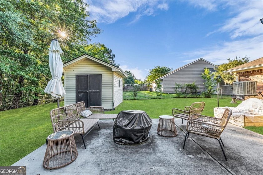 Welcome home to this charming 3-bedroom, 2-bath home in the - photo 34