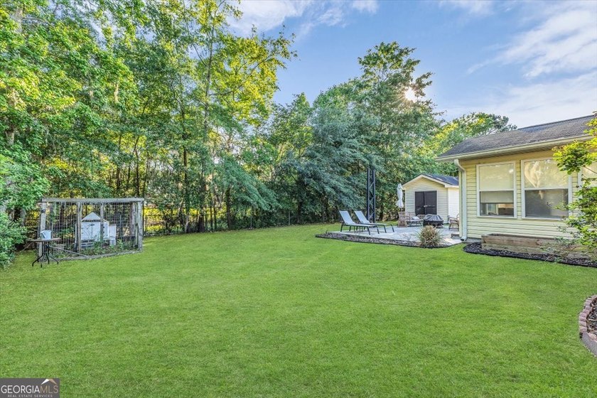 Welcome home to this charming 3-bedroom, 2-bath home in the - photo 39