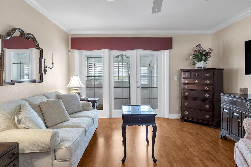 Welcome to this beautifully updated villa, featuring a spacious - photo 6