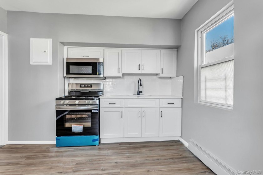 Welcome to 171-38 105 Avenue, a beautifully renovated two-family - photo 19