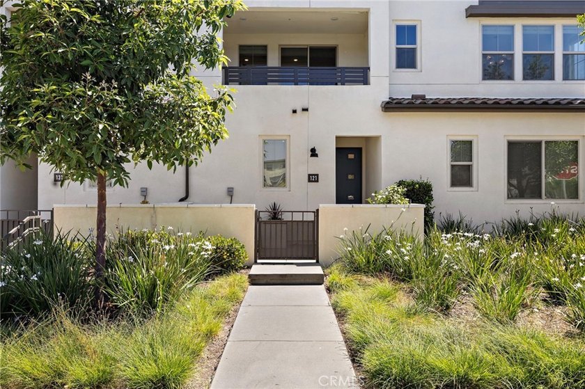 Experience the beauty of this former model home located in the - photo 2