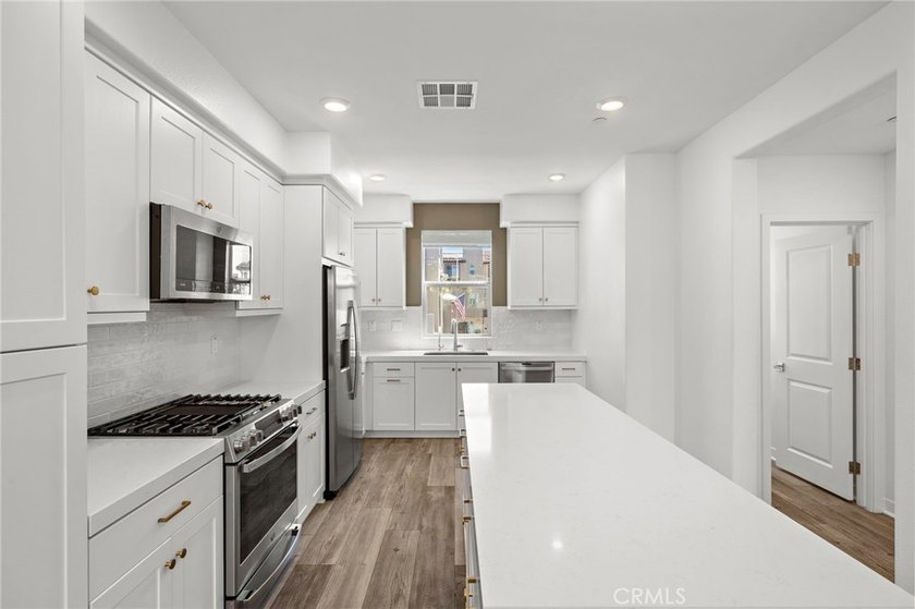 Experience the beauty of this former model home located in the - photo 6