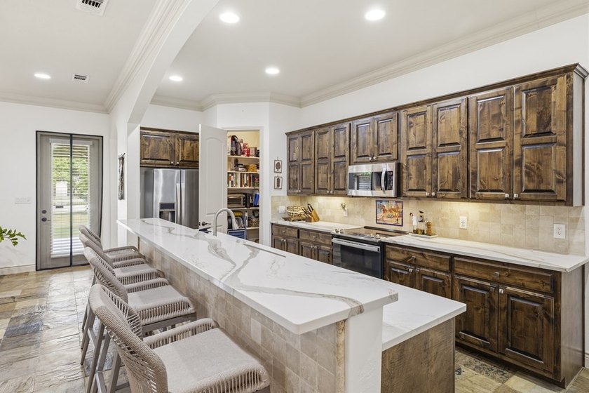 This thoughtfully designed home combines comfort, quality - photo 11