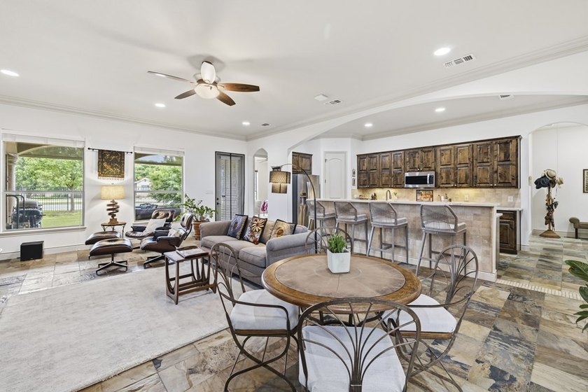 This thoughtfully designed home combines comfort, quality - photo 18