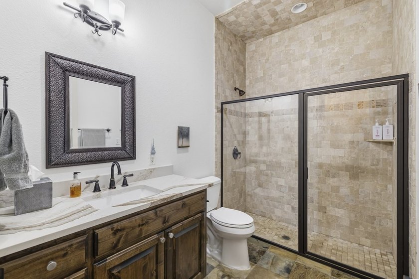 This thoughtfully designed home combines comfort, quality - photo 26