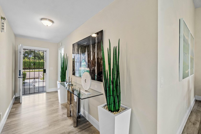 Rarely available &amp; totally remodeled 2-bed, 2-bath END UNIT - photo 3