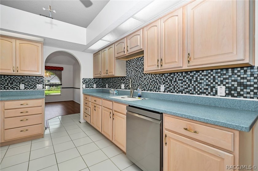 Welcome to this light and bright three-bedroom pool home tucked - photo 12