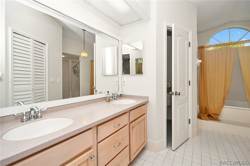 Welcome to this light and bright three-bedroom pool home tucked - photo 18