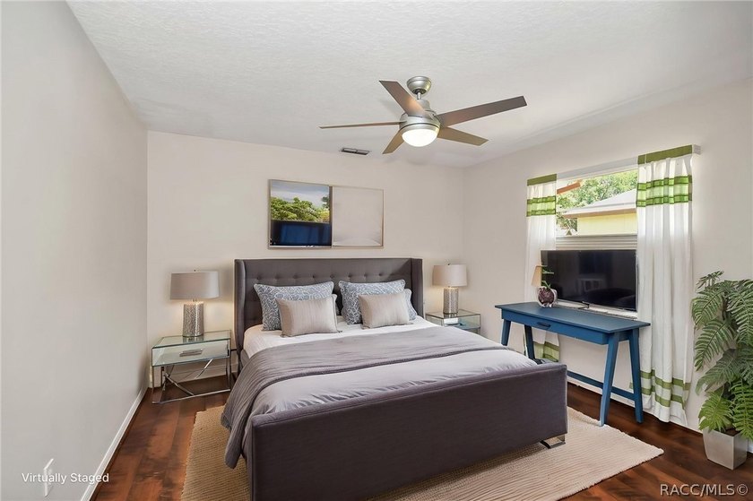 Welcome to this light and bright three-bedroom pool home tucked - photo 21