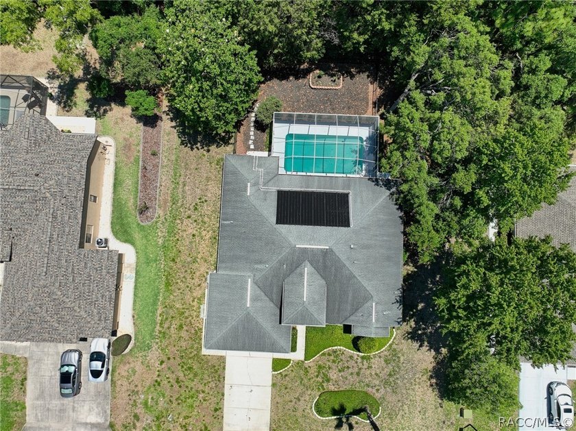 Welcome to this light and bright three-bedroom pool home tucked - photo 41