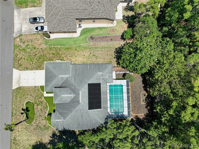Welcome to this light and bright three-bedroom pool home tucked - photo 44