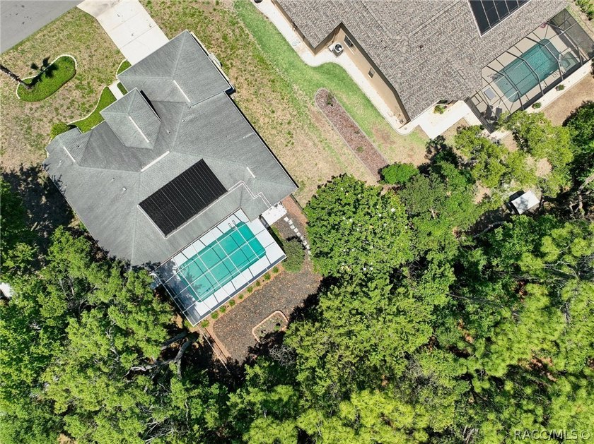 Welcome to this light and bright three-bedroom pool home tucked - photo 45