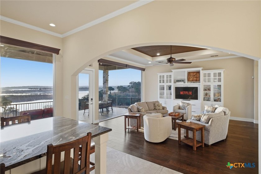 Experience true lakefront living in this stunning custom home - photo 11