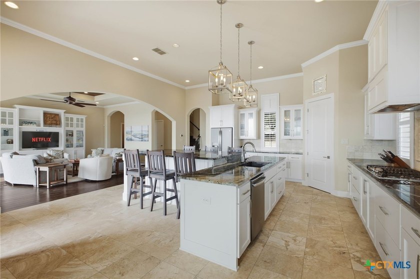 Experience true lakefront living in this stunning custom home - photo 13