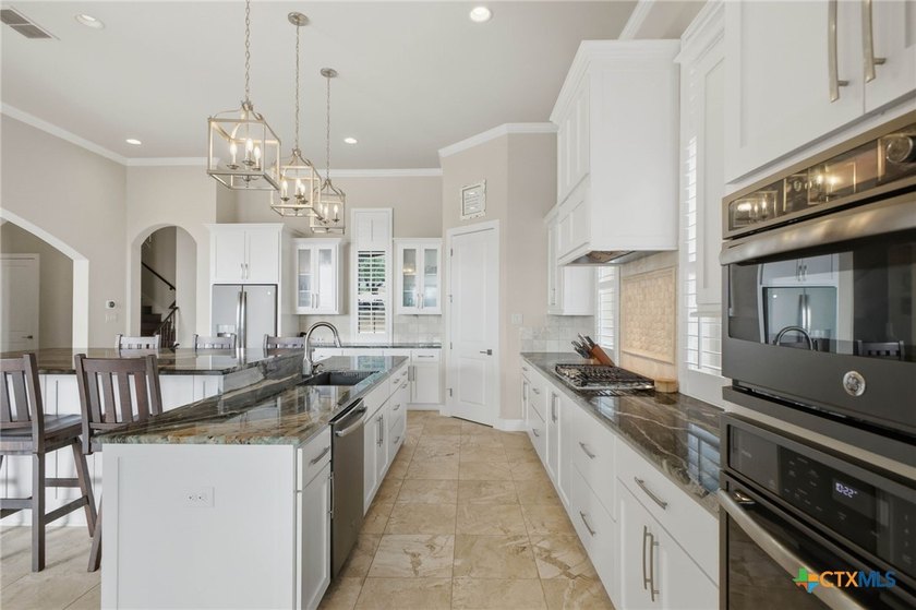 Experience true lakefront living in this stunning custom home - photo 15