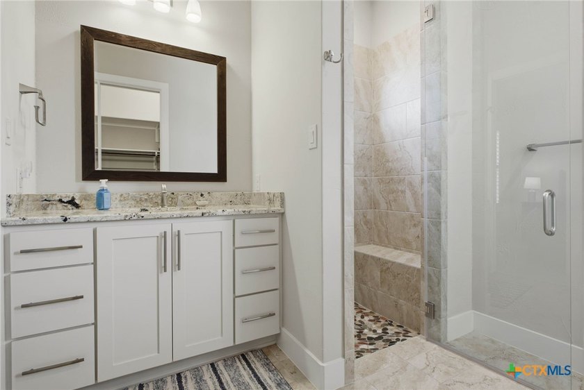 Experience true lakefront living in this stunning custom home - photo 25